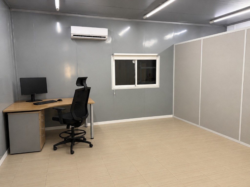 Workspace with desk and computer at Zhuoli Europe headquarters